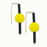 yellow rubber earrings made with sterling silver. Bold, fun design.