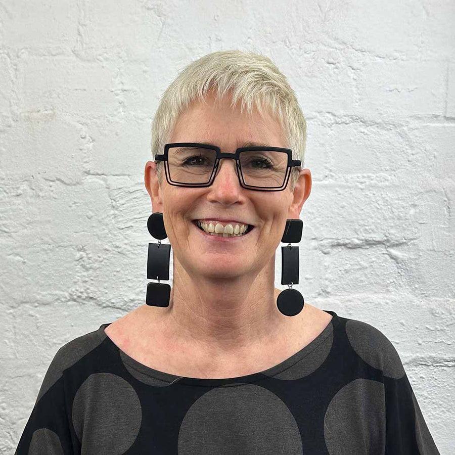 Rowan wearing dot and dash black drop lightweight earrings