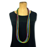 A long, multi-strand, primary-coloured rubber necklace by Frank Ideas