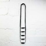 Long drop necklace with black small blocks