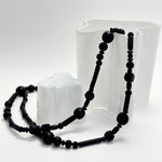 long black rubber bead necklace on Avar  Aalto vase