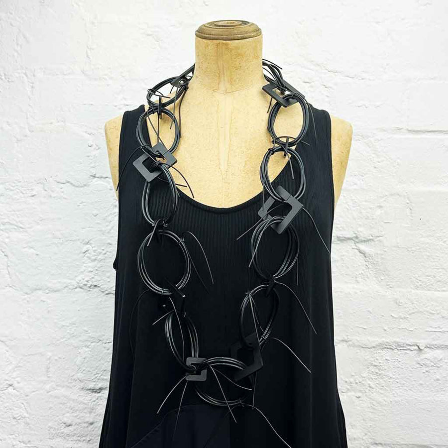 Long chaotic necklace recycled materials, full black