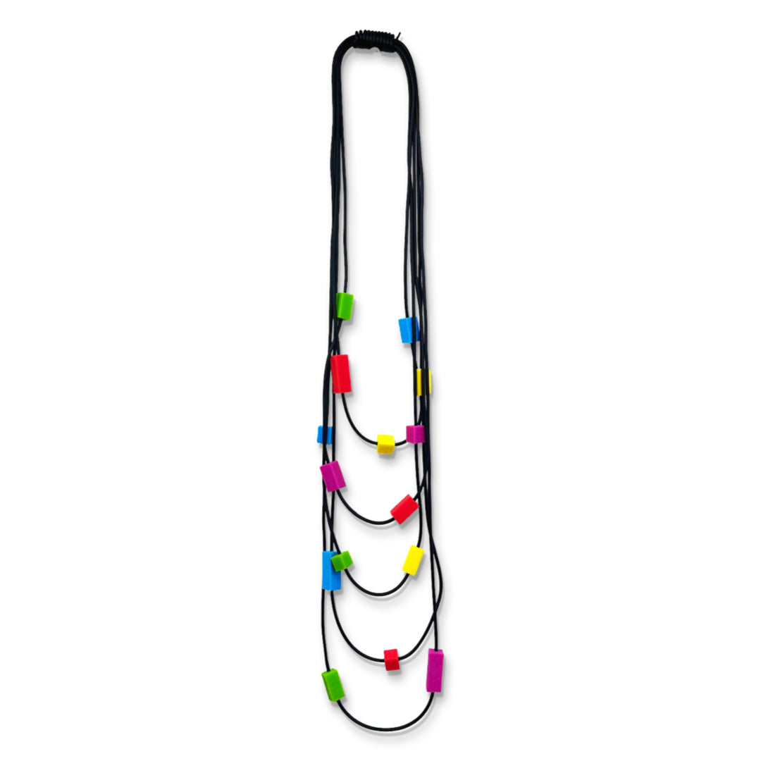 Multi strand necklace with colourful tiles in yellow, red, blue, pink and green.