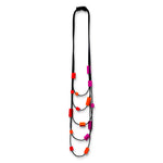 Multi strand necklace with red and. pink plastic beads on a mannequin