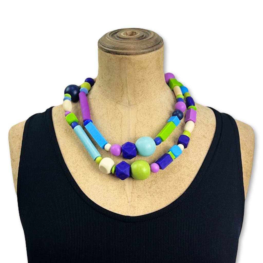 bold colour long  rubber bead necklace worn short