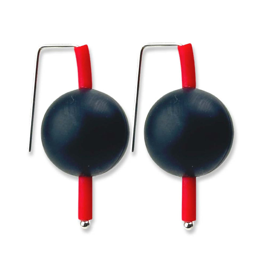 black and red supersized earrings on a white background
