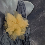 Fantasy Brooch in Butterscotch worn on black – rubber brooch with golden butterscotch tulle, handmade by Frank Ideas