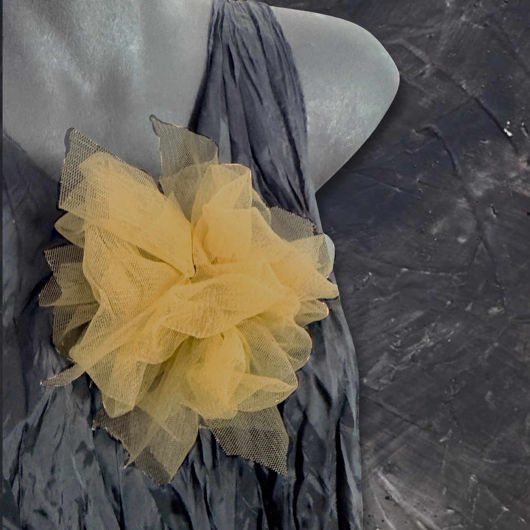Fantasy Brooch in Butterscotch worn on black – rubber brooch with golden butterscotch tulle, handmade by Frank Ideas