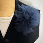 Fantasy Brooch in Midnight Teal worn on a black jacket – rubber and tulle statement brooch, handmade by Frank Ideas
