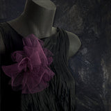 Fantasy Brooch in Wine worn on a black dress – rubber and tulle statement brooch, handmade by Frank Ideas