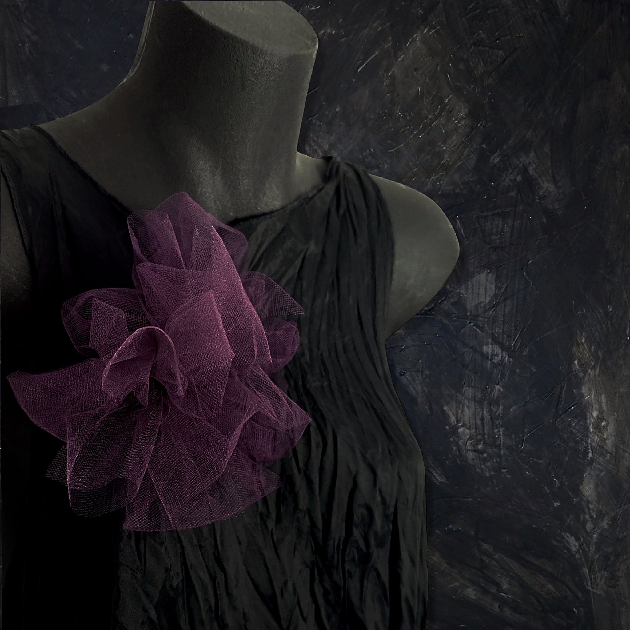 Fantasy Brooch in Wine worn on a black dress – rubber and tulle statement brooch, handmade by Frank Ideas