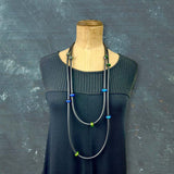 One of a kind glass bead and rubber necklace