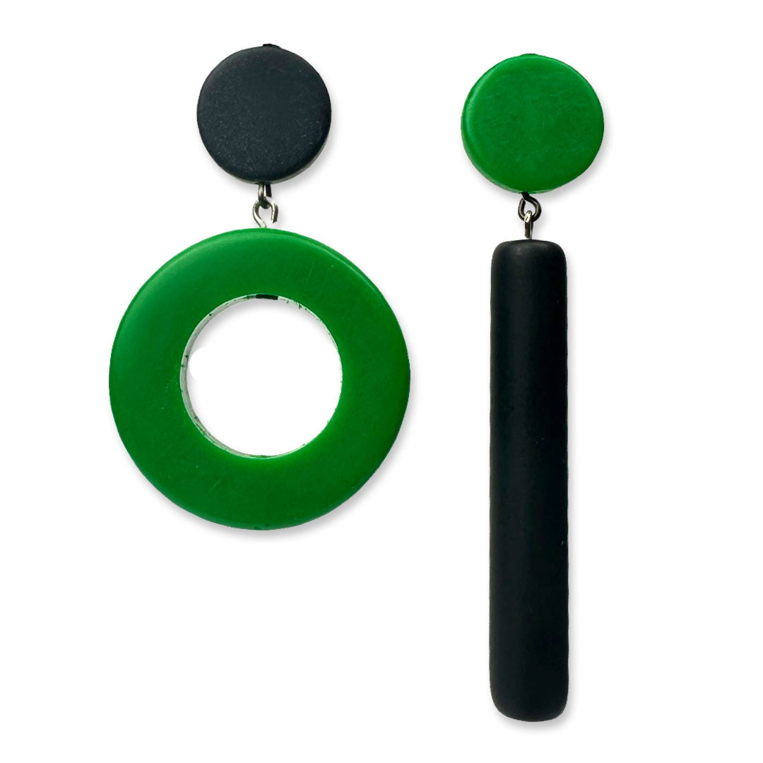 Asymmetrical green dot and dash earrings on a white background