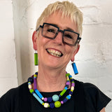 long geometric bead necklace