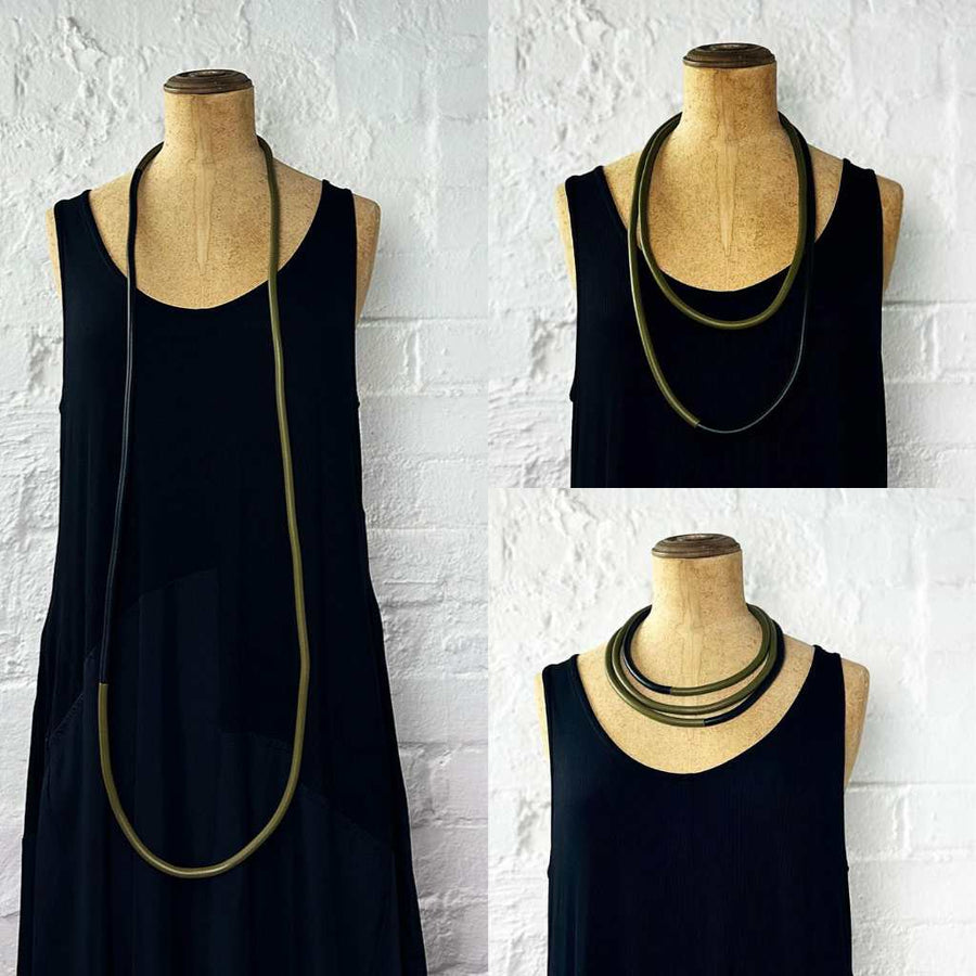 mannequin showing ways to wear the two tone statement necklace, long or short