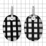 Perspex convertible huggie earrings in gloss black and white gingham by Frank Ideas