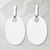 reversible white/black perspex earrings, white side. Frank Ideas