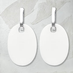reversible white/black perspex earrings, white side. Frank Ideas