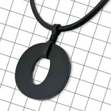 Reverse side of Perspex O necklace showing matte black finish by Frank Ideas