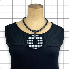 Perspex O necklace in gloss black and white gingham by Frank Ideas