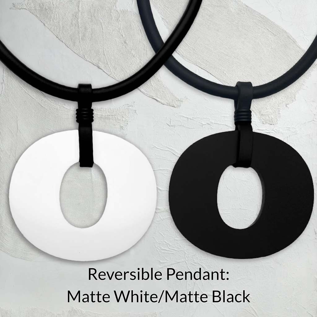 Reversible Perspex O necklace in matte white and matte black by Frank Ideas