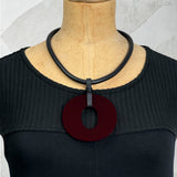 Reversible Perspex O necklace in matte wine by Frank Ideas