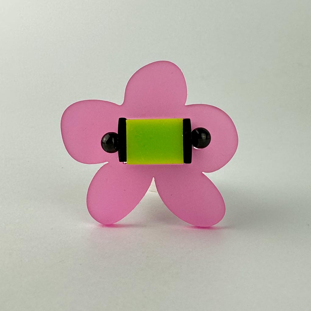 pink and lime green chunky perspex flower shaped ring