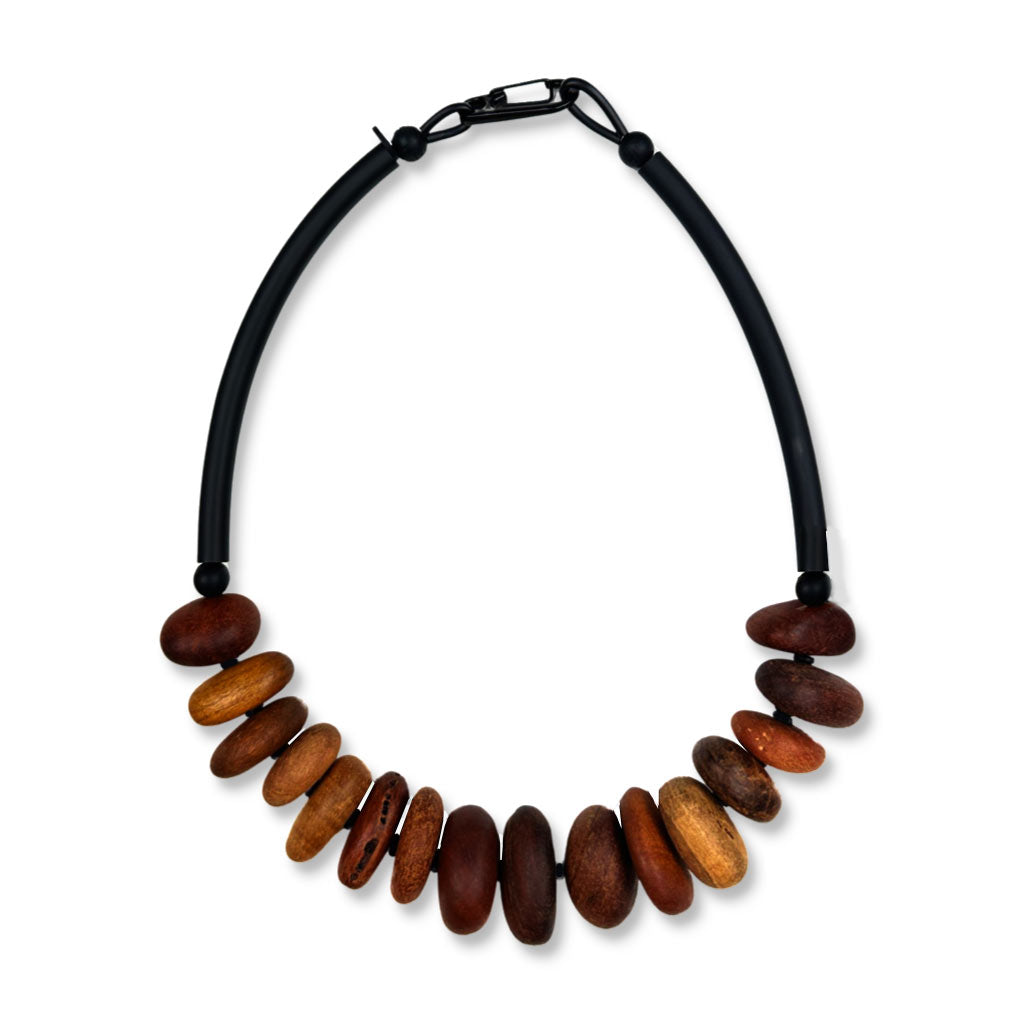 wooden pebble necklace on a white background