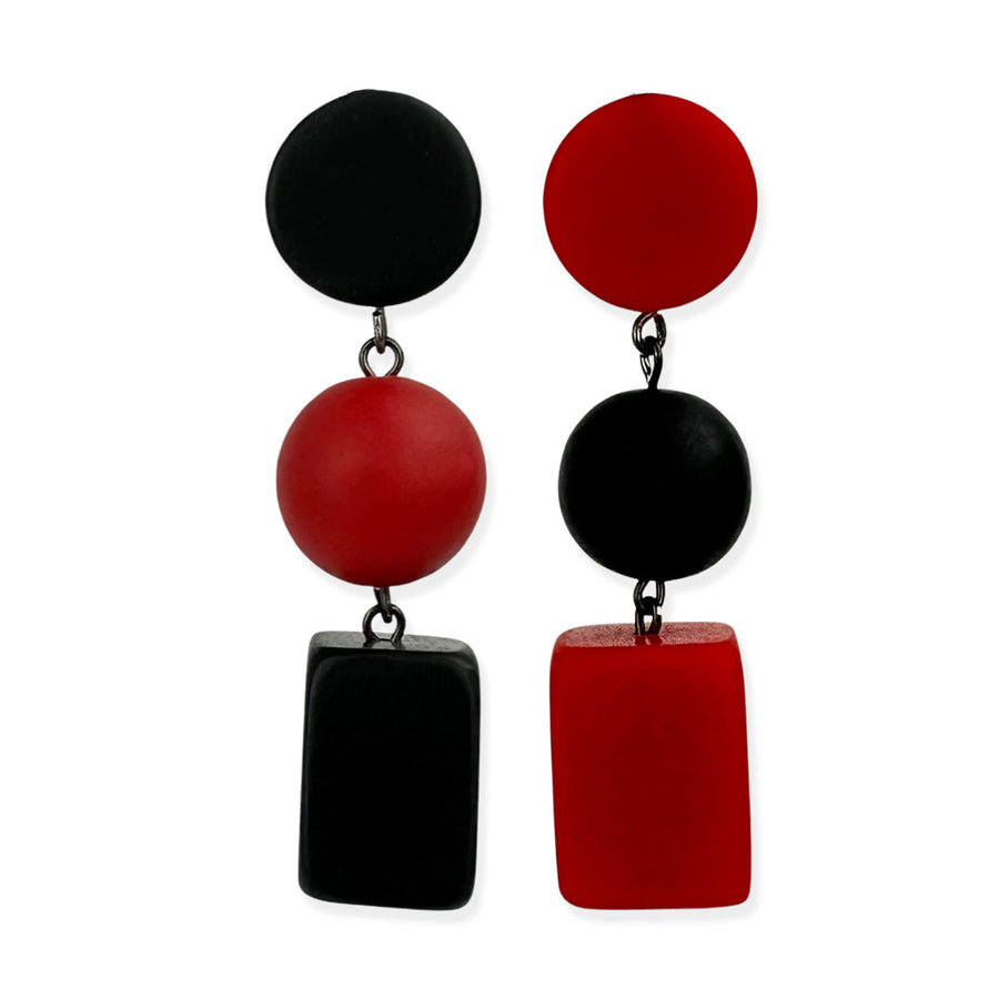 black and red dangling earrings on a white background