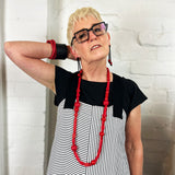long geometric bead necklace