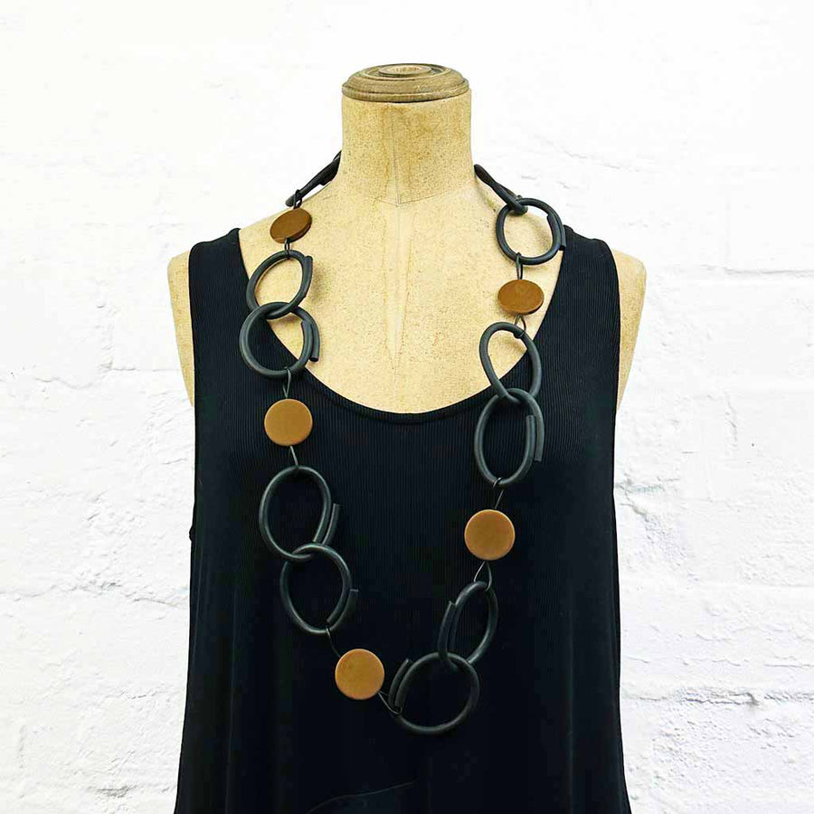 Resin and rubber long chain necklace black with tan dots