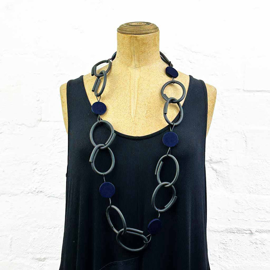 Resin and rubber long chain necklace black with blue dots