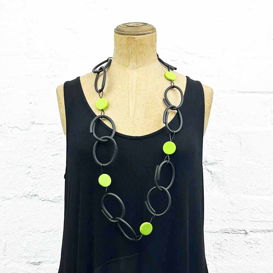 Resin and rubber long chain necklace black with lime green dots