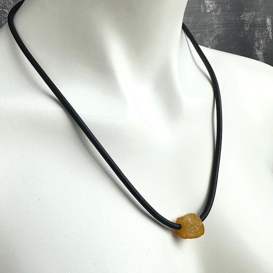 short single bead and thin rubber necklace -rough cut amber agate bead