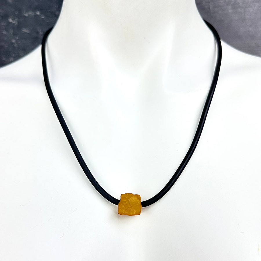 short single bead and thin rubber necklace -rough cut amber agate bead