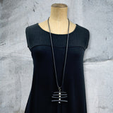 rubber and pearl pendant