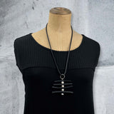 rubber and pearl pendant
