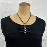 rubber and pearl pendant