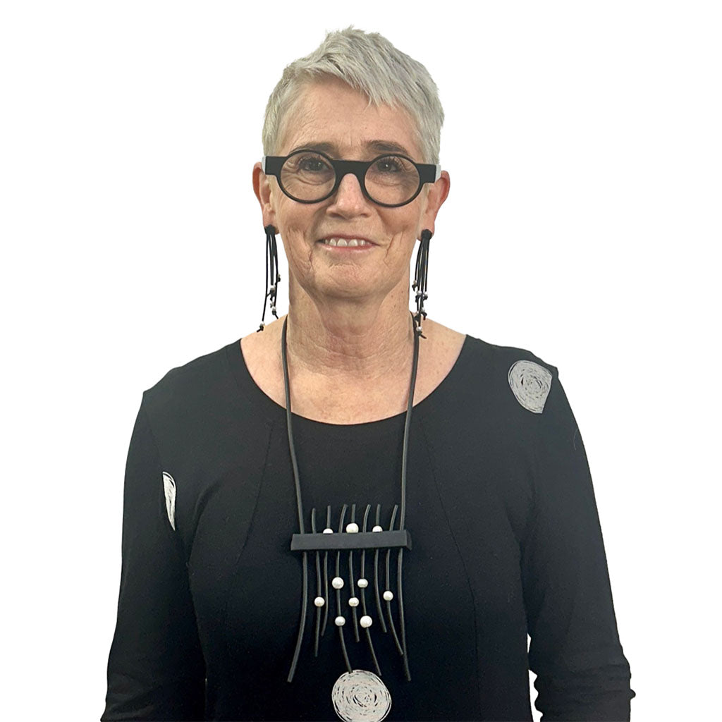 designer, rowan shaw wearing the Pearl and rubber Show Stopper necklace