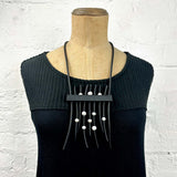show stopper rubber and pearl necklace