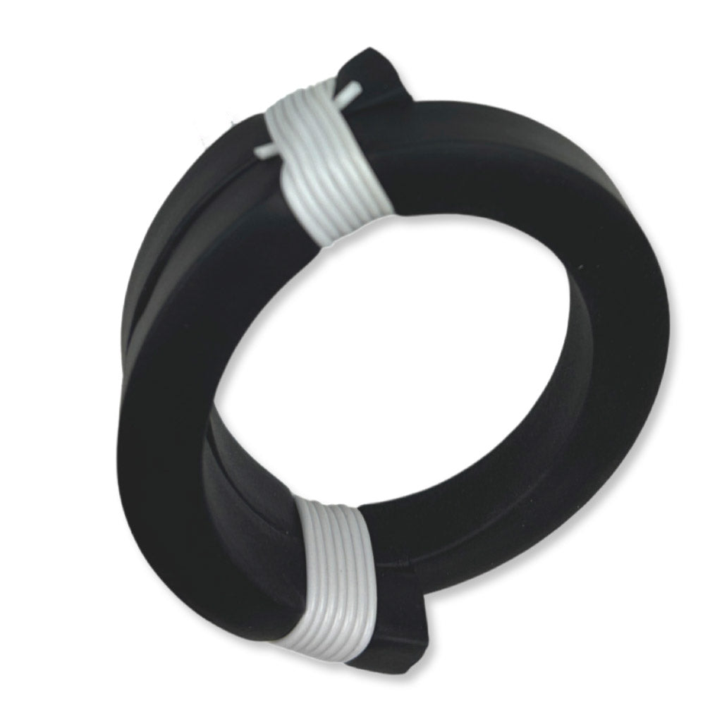 black rubber bangle on a white background