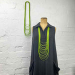 Light spaghetti necklace in spring green rubber by Frank Ideas