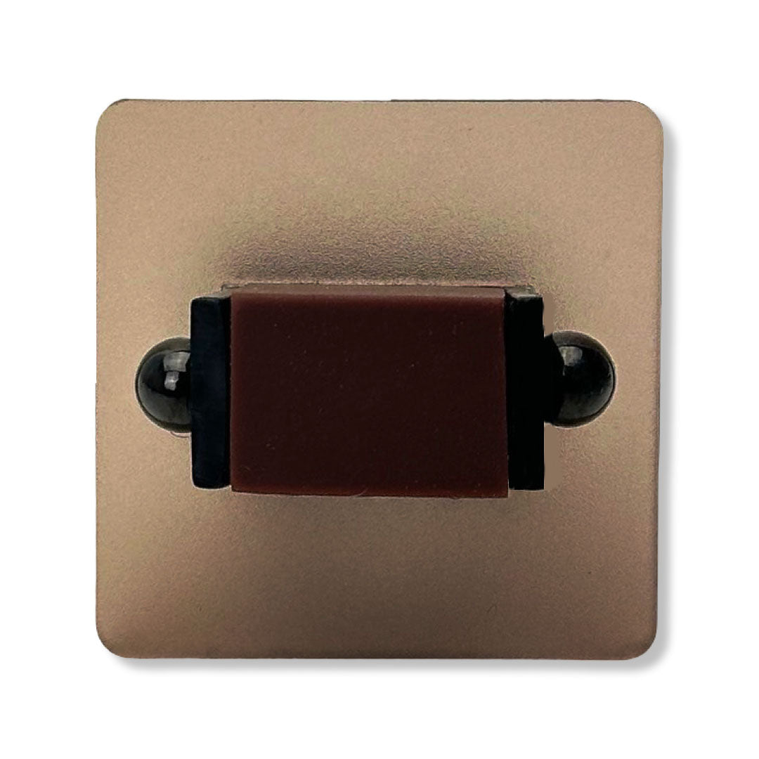 Brown square ring with black centre on a white background