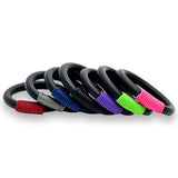 Set of black rubber bracelets  with colorful details on a white background