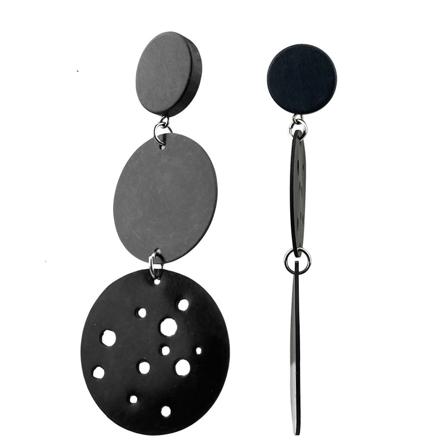 side view edgy black rubber earrings with holes