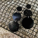 holey rubber disk earrings