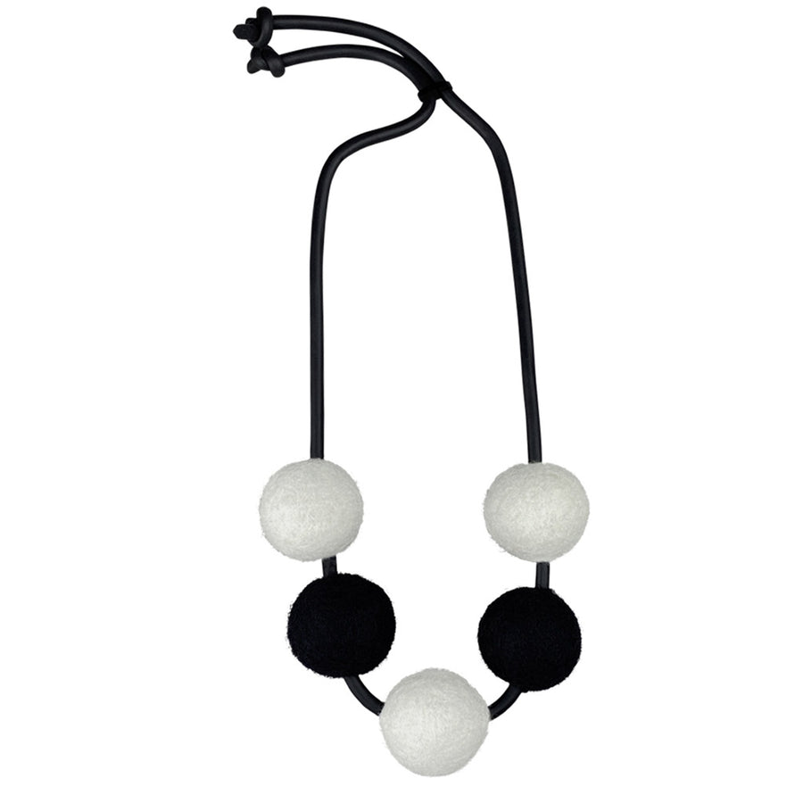 black and white 5 felt bead necklace on a white background