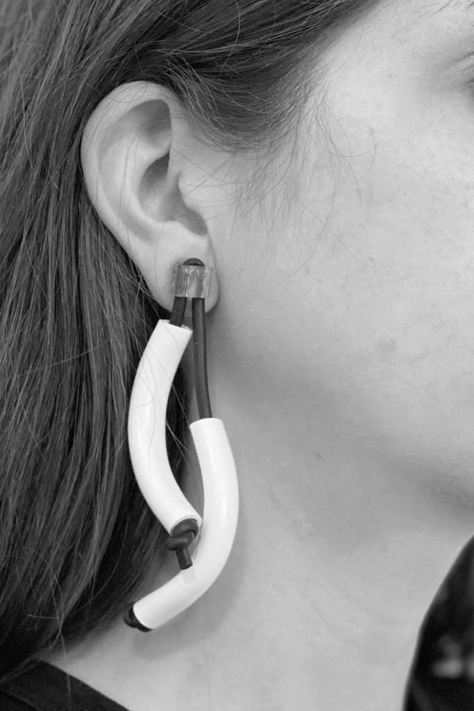 white earrings made from recycled acrylic