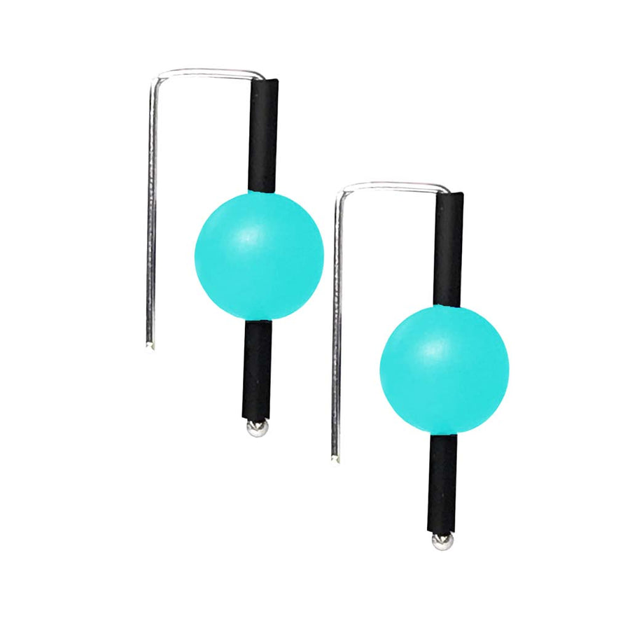 Teal rubber earrings made with sterling silver. Bold, fun design.