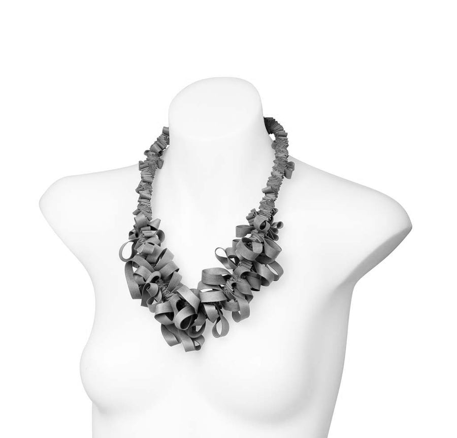 rubber ruffle -charcoal ends of line